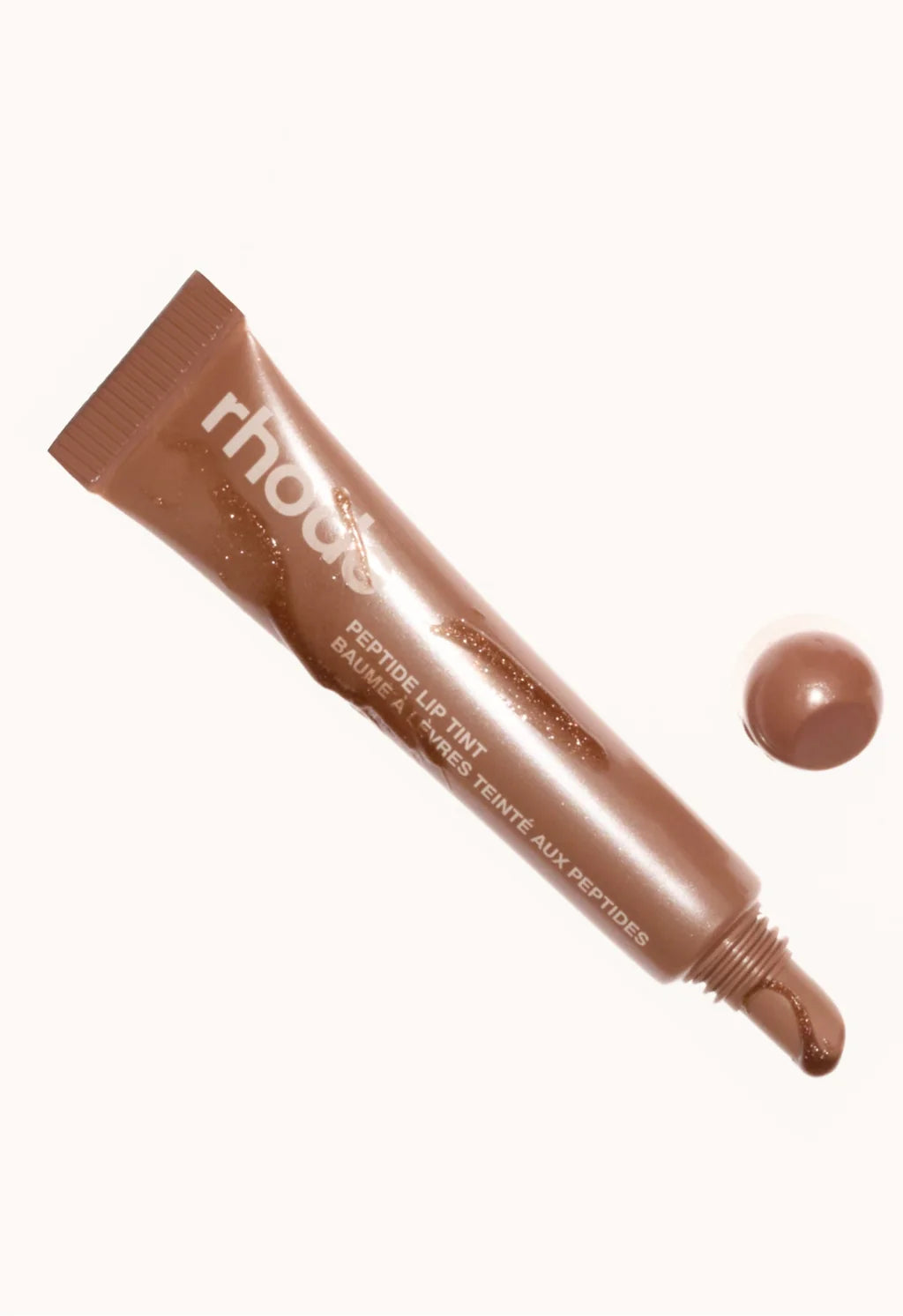 peptide lip tint in sweet apple - 
shimmery golden brown